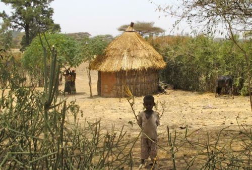 children and traditional house